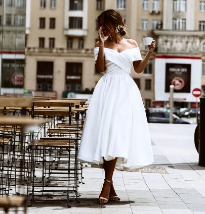 wearing tea-length wedding dress